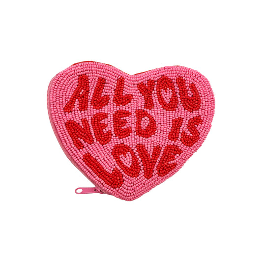 Heart-shaped pouch with 'All You Need Is Love' text on a white background