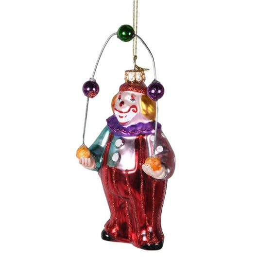 Colorful glass clown ornament on a white background