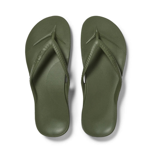 Pair of khaki flip-flops on a white background