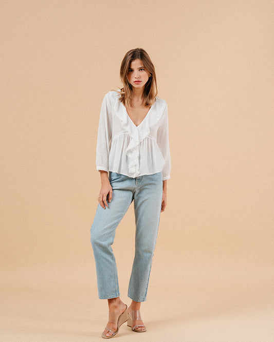 Ecru Memory Blouse paired with denim jeans