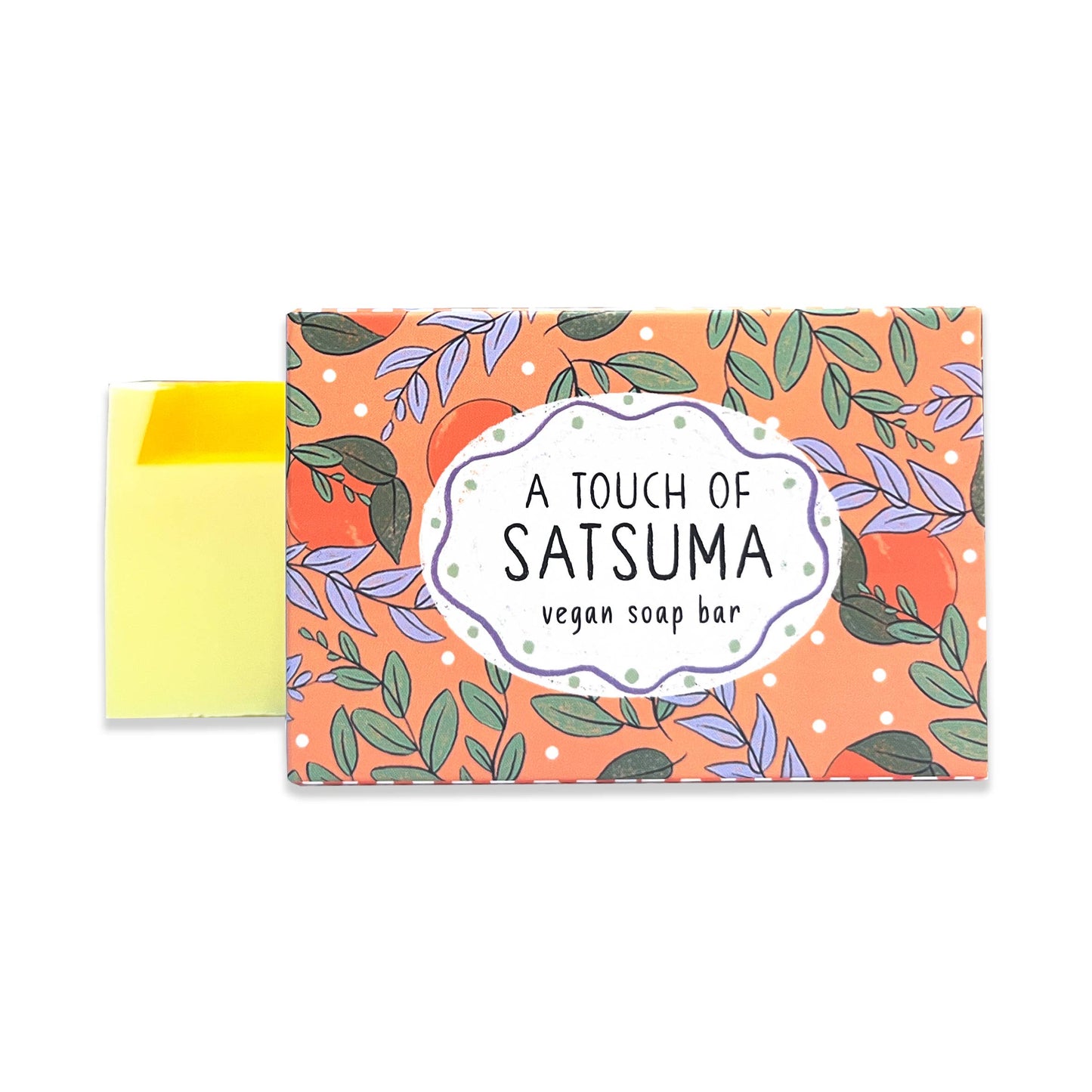 Vegan soap bar with decorative packaging featuring leaves and a touch of Satsuma branding.