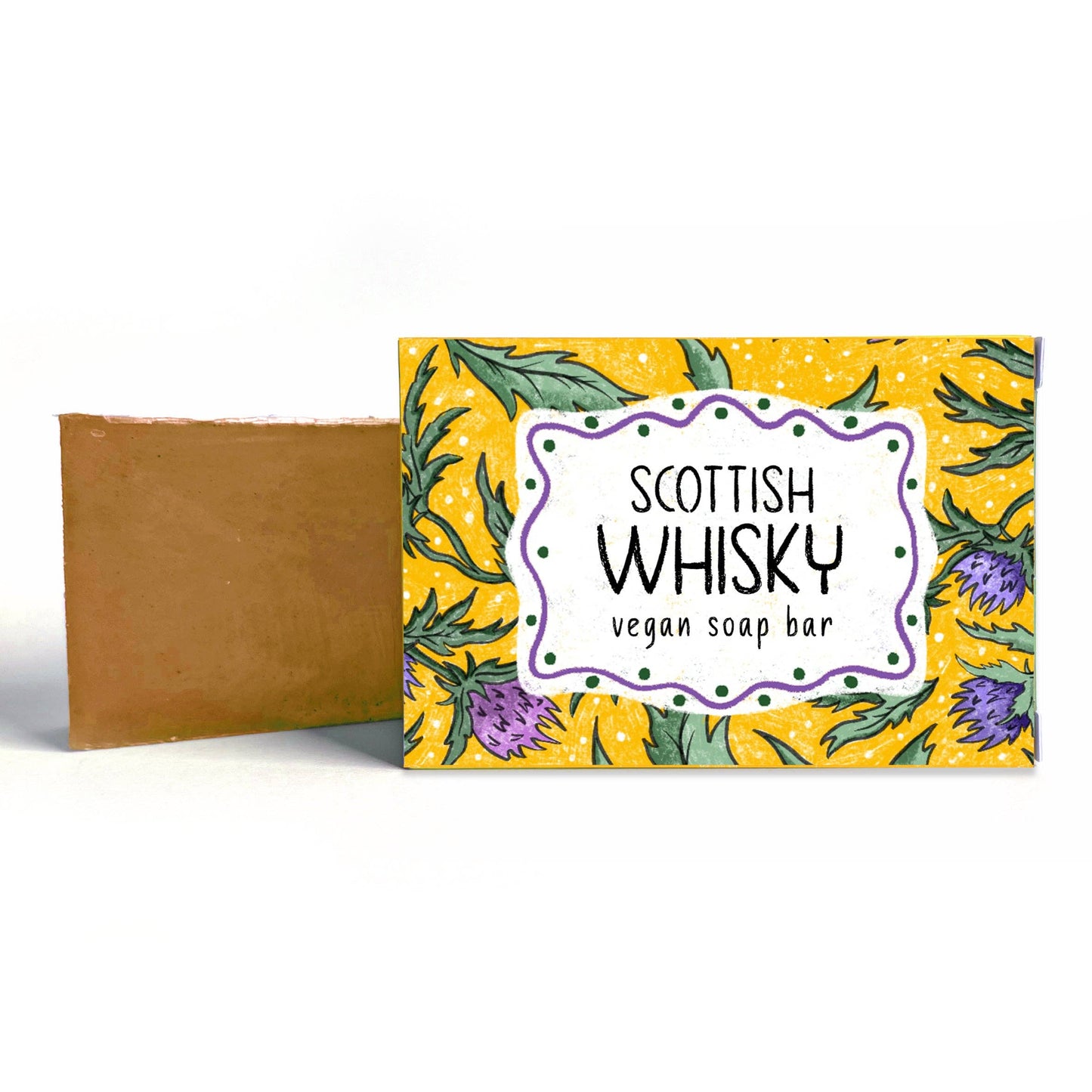 Vegan soap bar with 'Scottish Whisky' label on a yellow background