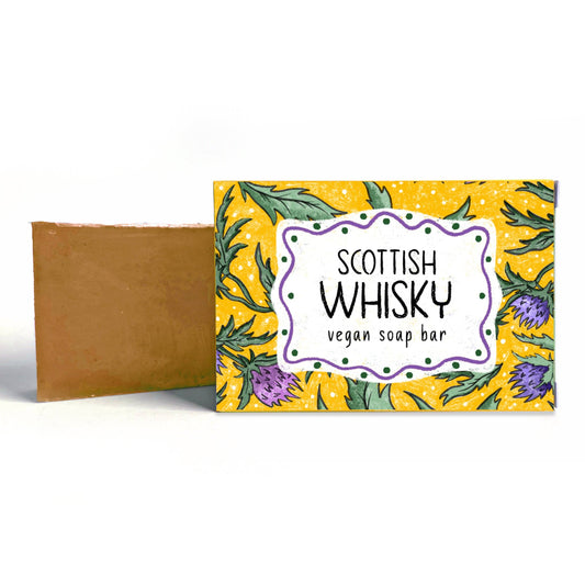 Vegan soap bar with 'Scottish Whisky' label on a yellow background