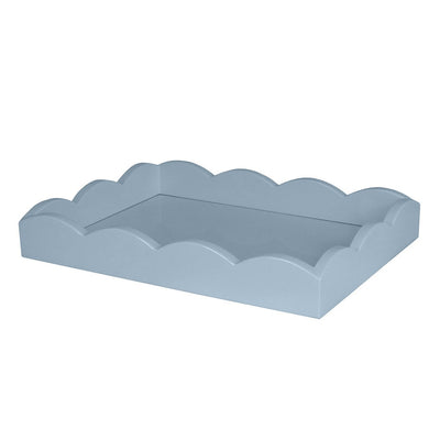 Blue scalloped-edge tray on a white background