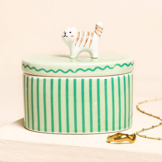 Lisa Angel - Green Oval Ceramic Cat Trinket Pot - Green and white striped jewelry box with a cat-shaped handle on a beige background