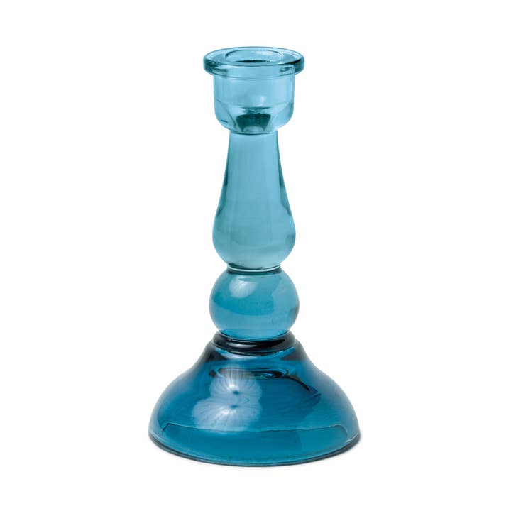 Blue glass candle holder on a white background