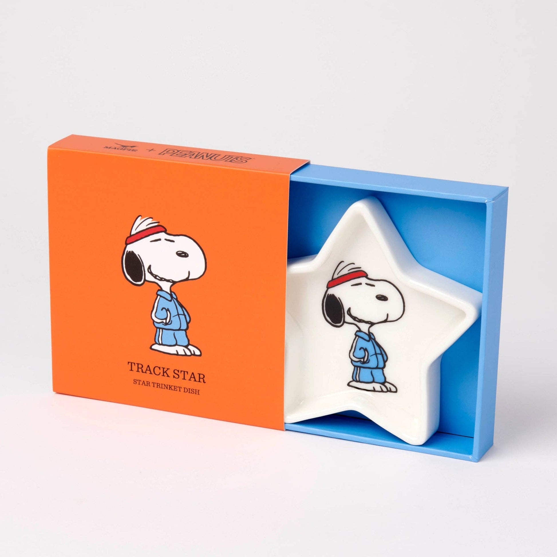 Star-shaped dish with cartoon character in an orange and blue box