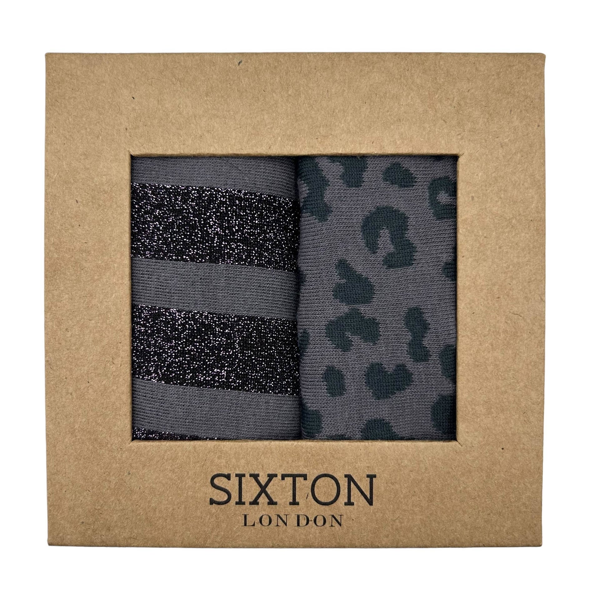 A box containing two pairs of Sixton London socks, one pair with charcoal leopard print and the other pair with purple Berlin pattern.