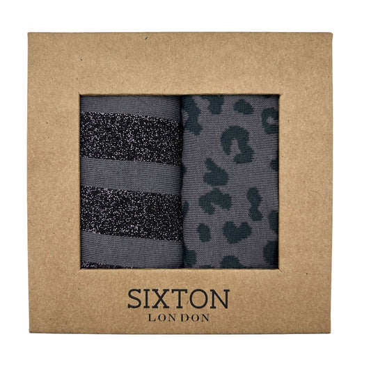 A box containing two pairs of Sixton London socks, one pair with charcoal leopard print and the other pair with purple Berlin pattern.