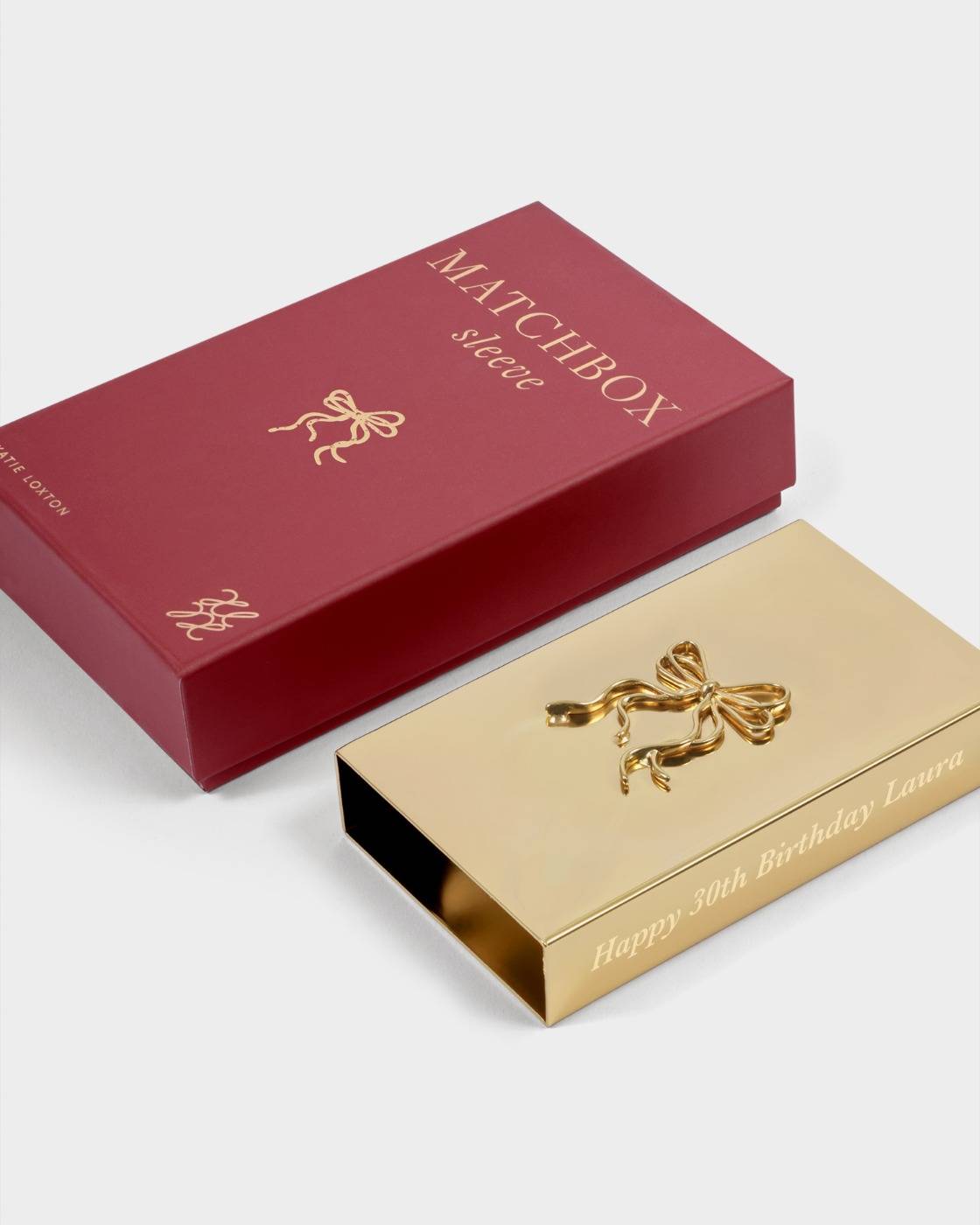 Katie Loxton Metal Bow Matchbox Sleeve