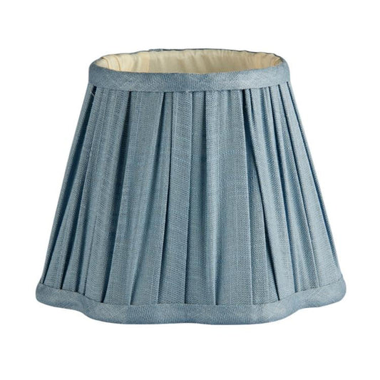 Blue pleated lampshade on a white background