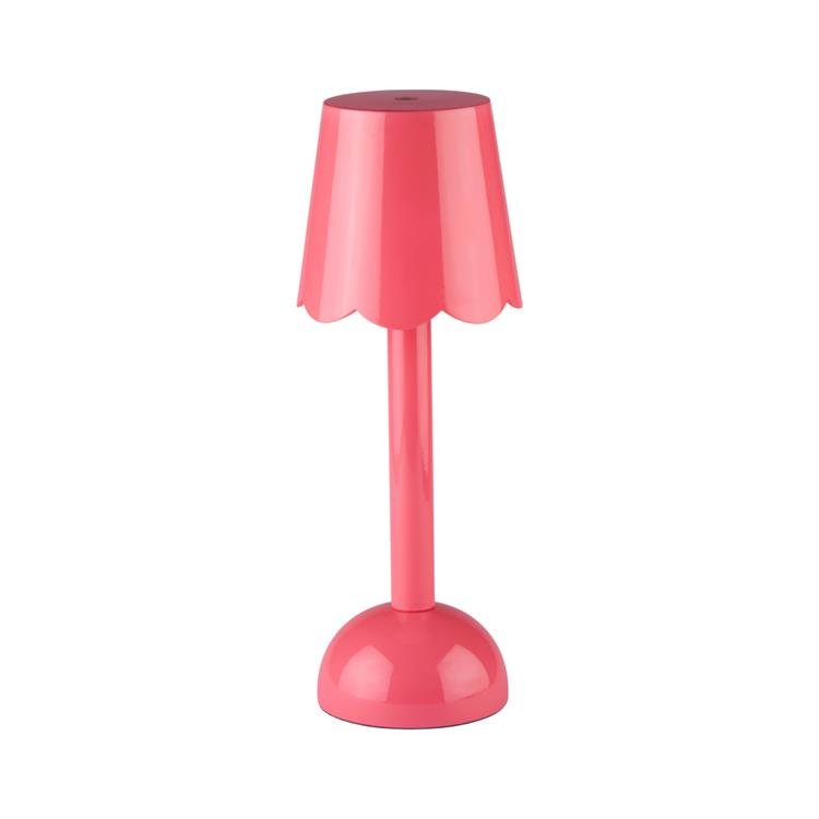 Pink table lamp on a white background